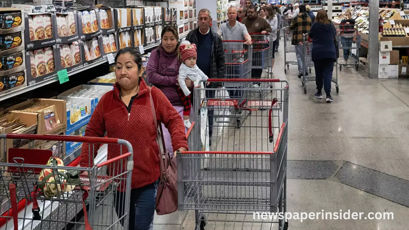 Americans boost spending slightly amid economic worries